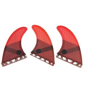 Surfing with the Medium-Sized Single Tab Fin G5 Tri Fin Set - Available in Vibrant Purple