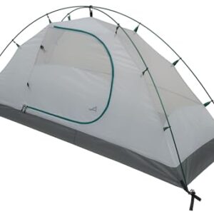 ALPS Mountaineering Lynx 1-Person Tent in Dark Teal/Gray, set up in a scenic outdoor environment, showcasing its compact design and sturdy construction.