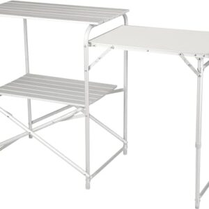 Portable, weather-resistant aluminum camping roll top kitchen setup with adjustable legs, perfect for outdoor cooking on uneven ground.