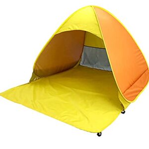 Pop-up beach tent set up on the sand, featuring a bright yellow/orange color with a spacious interior for 1-3 people