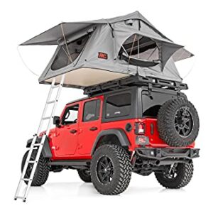 Rough Country Roof Top Tent mounted on a vehicle, showcasing its spacious interior, LED light kit, and robust design