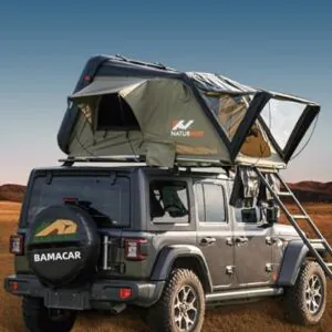 Naturnest Hard Shell Rooftop Tent mounted on a vehicle, showing its easy setup mechanism, spacious interior with mattress, included chairs, and elevated position for a cleaner camping experience