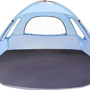 WhiteFang Beach Tent set up on the sand, featuring large roll-up mesh windows, thickened fiberglass rods