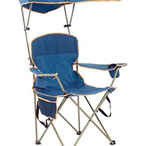 Person enjoying the sun in the Quik Shade MAX Relaxing Chair with adjustable canopy, highlighting its portability and sun protection features