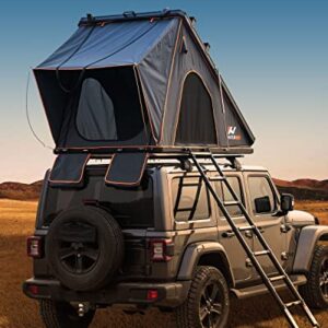 Naturnest Hardshell Rooftop Tent set up on a vehicle, showcasing its durable construction, spacious interior, LED lights, and mesh windows in a scenic outdoor setting