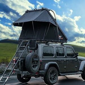 Naturnest Hard Shell Rooftop Tent set up on an SUV, showcasing its spacious interior and durable construction with storage pockets and LED lighting.