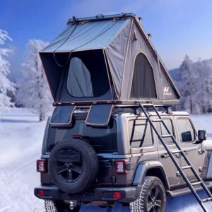 Naturnest hardshell rooftop tent installed on a vehicle, showcasing its durable aluminum design and spacious interior, perfect for camping and travel.