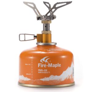 Fire-Maple FMS-300T ultra-light titanium portable stove folded up and compact, ideal for hiking and camping with award-winning design.