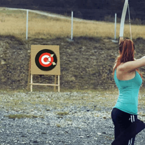 Lightweight, 24cm foam target board for archery, crossbow, and slingshot practice with vibrant black and white colors for outdoor use